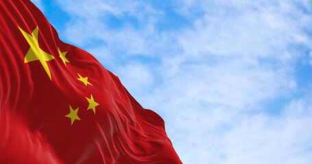 The flag of China waving on a sunny day