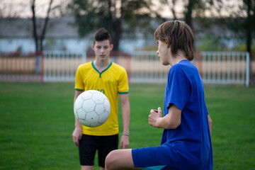 Two boys on the soccer field