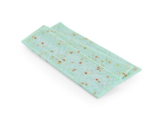Sticks of tasty chewing gum isolated on white