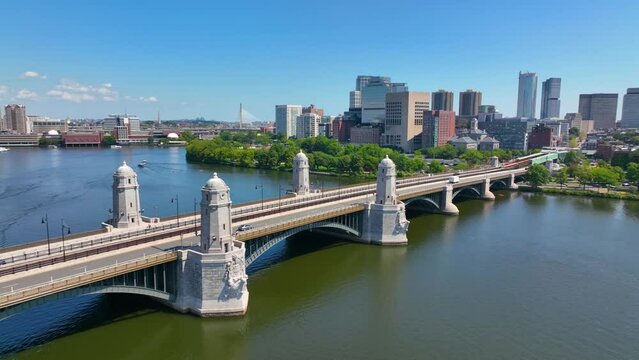 Longfellow Bridge cross over Charles River, with Boston financial district modern city skyline at the back, in downtown Boston, Massachusetts MA, USA. 