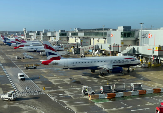 Crawley, Sussex, England, UK. 2022.  Passenger jets on the apron of an airport.
