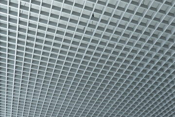 grid ceiling background is beautiful because it is designed to cover traces of original ceiling resulting in modern grid ceiling pattern. backdrop of ceiling is decorated with steel in grid pattern.