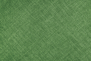 Jacquard woven upholstery, light green coarse fabric texture with diagonal weave lines. Textile...