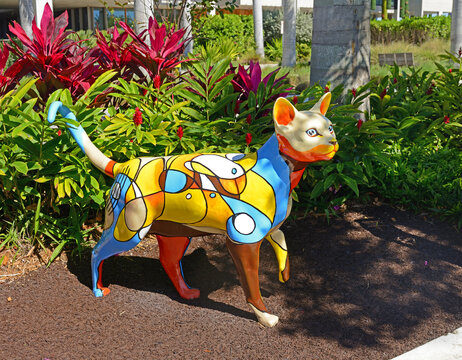 Beautiful and fashionable cat. Dogs and Cats Walkway and Sculpture Gardens, path of painted cat and dog sculptures in Maurice A. Ferre Park. Miami, Florida