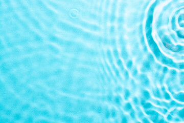 Water surface texture, blue background.