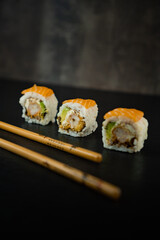 close up sushi. japanese food on a black background