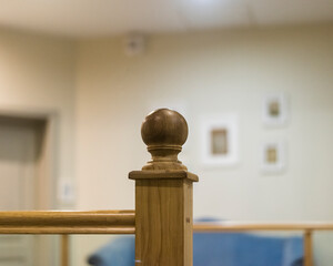 wooden balustrade with wooden ball at the top of the apartment