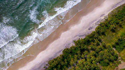 Aerial view of the paradisiacal beach of Itacarezinho, Itacare, Bahia, Brazil. Tourist place with sea and vegetation. top view