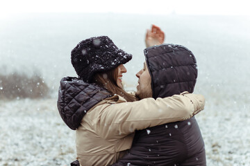 real emotions.romance in nature.Couple in love.Winter portrait.happy couple.Happiness.Hugs of...
