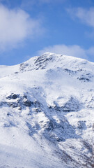 Fototapeta na wymiar snowy mountain landscape on a sunny day