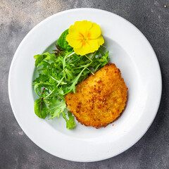 cordon bleu cutlet chicken meat, cheese, bacon second course meal snack on the table copy space food background rustic top view