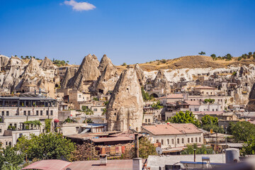 Fototapeta premium Beautiful stunning view of the mountains of Cappadocia and cave houses. Turkey