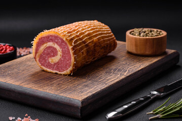 Delicious roll with meat, cheese, mushrooms, spices and herbs