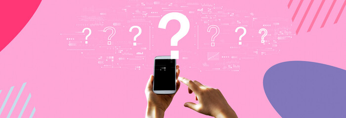 Question marks with person using a smartphone