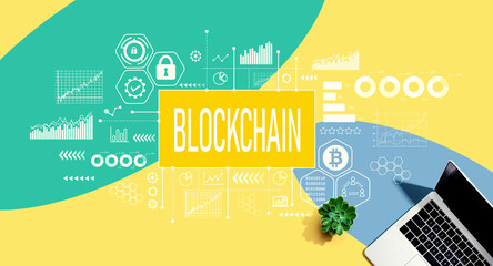 Blockchain theme with a laptop computer on a yellow, green and blue pattern background