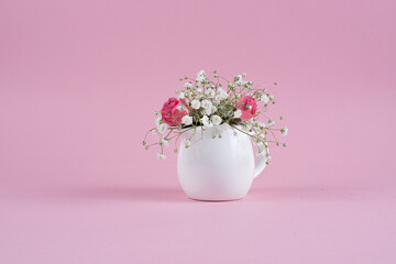 gypsophila flowers and roses in jug 8 march consept