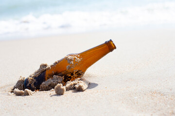 Glass bottle on the beach