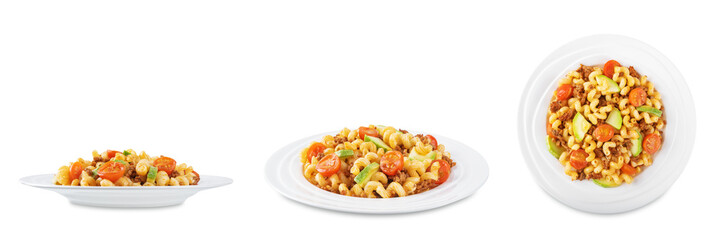 Minced beef zucchini tomatoes pasta in a plate on a white isolated background
