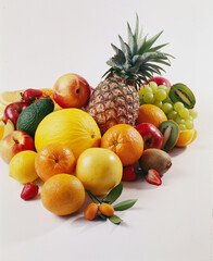 Photo studio of fresh fruits such as orange, grapefruit, apple, melon, pineapple, grape and...