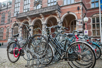 Fototapeta na wymiar Bicycles parked on the street of Groningen, Netherlands