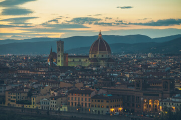 Fototapeta na wymiar Panoramic view at Duomo Santa Maria Del Fiore and Bargello in Florence, Italy during the sunset