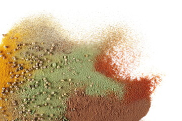 Mixed spice, turmeric, coriander, parsley, cinnamon ground, cayenne pepper, ground white pepper, lemongrass powder isolated on white, top view 