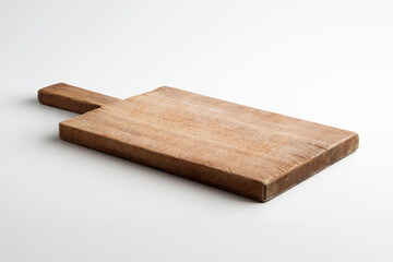 Rustic rectangular wooden cutting board isolated on white background