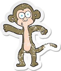 retro distressed sticker of a cartoon monkey
