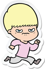 sticker of a annoyed cartoon boy