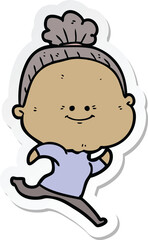 sticker of a cartoon happy old woman