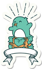 sticker of tattoo style penguin sitting on present