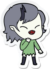 sticker of a cartoon laughing vampire girl