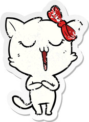 distressed sticker of a cartoon cat