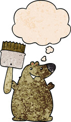 cartoon bear with paint brush and thought bubble in grunge texture pattern style