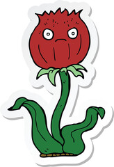 sticker of a cartoon thistle