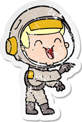 distressed sticker of a happy cartoon astronaut