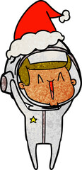 happy textured cartoon of a astronaut wearing santa hat