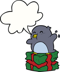 cartoon penguin on wrapped present and speech bubble