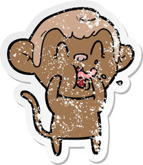 distressed sticker of a crazy cartoon monkey