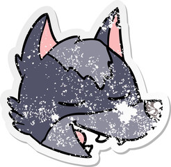 distressed sticker of a cartoon wolf face