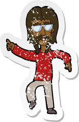 Obraz na płótnie Canvas retro distressed sticker of a cartoon hippie man wearing glasses