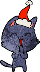 happy textured cartoon of a cat wearing santa hat