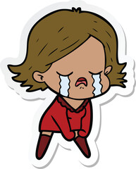 sticker of a cartoon girl crying