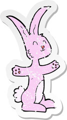 retro distressed sticker of a cartoon rabbit