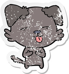 distressed sticker of a cartoon dog sticking out tongue
