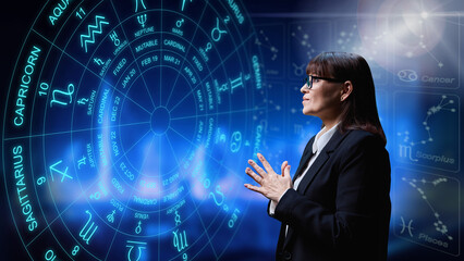 Woman interested in astrology, universe stars astrological wheel background
