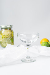 Empty coupe glass a marble tray