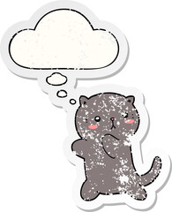 cute cartoon cat and thought bubble as a distressed worn sticker