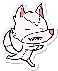 sticker of a cartoon wolf showing teeth