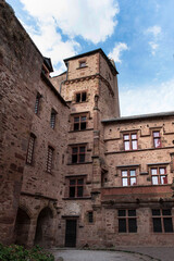 Fototapeta na wymiar Very old red stone house in the city of Rodez in France 